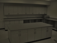 Image of Darkroom cabinets in simulated darkroom lighting conditions