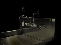 Image of Stainless Steel Tray Sink - Chrome Plated fixture in simulated darkroom lighting conditions.